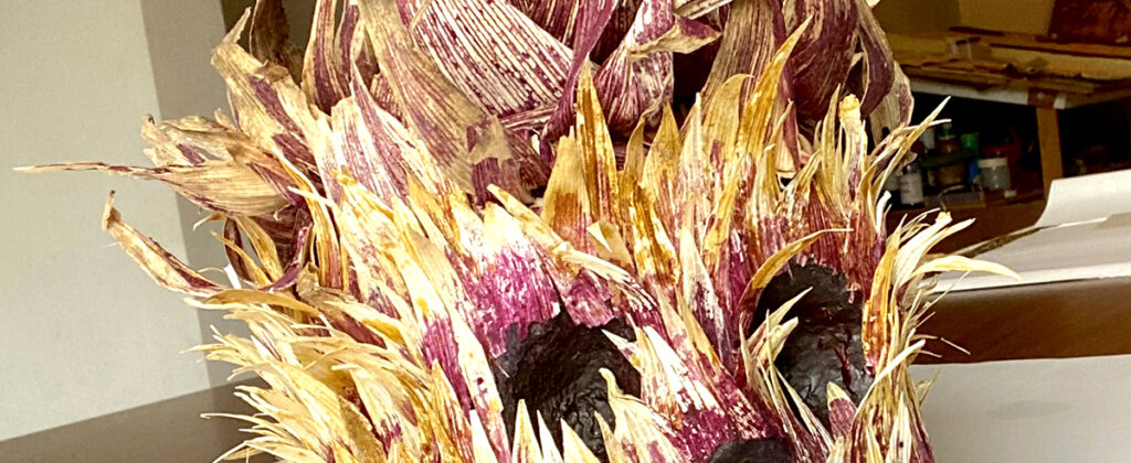 SantiagoRobles, Maiz, Craneo, Calavera, Tlacatlaolli, HojasDeMaiz, fuego, mariposa, escultura